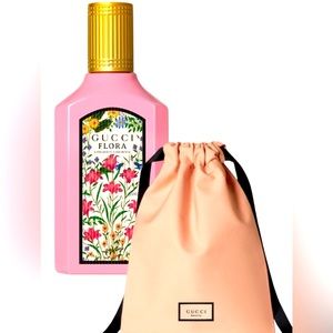 Gucci pink bag new in bag.. Includes mini size 5ml of Gucci Flora Parfum.